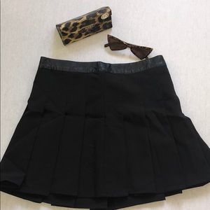 Black pleated tennis skirt with leather waist. New